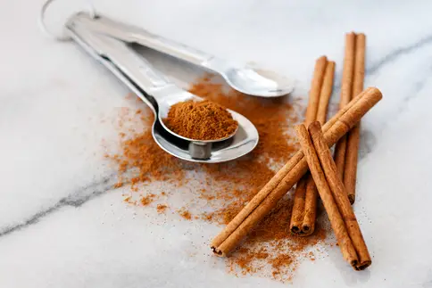 photo of cinnamon sticks and powder