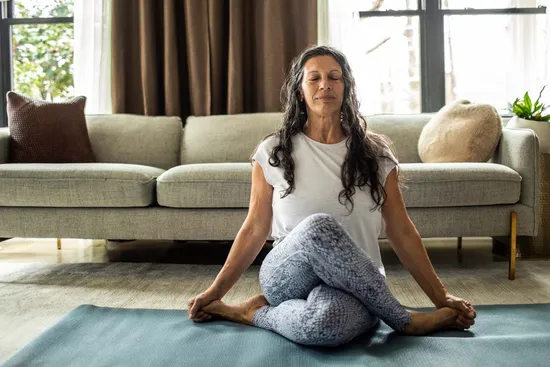photo of holding yoga pose at home