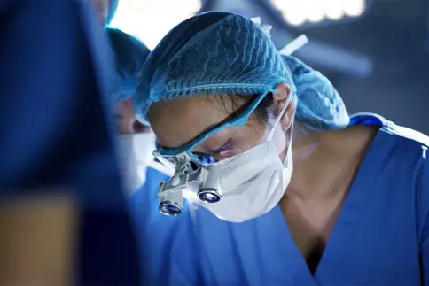 photo of surgeon operating