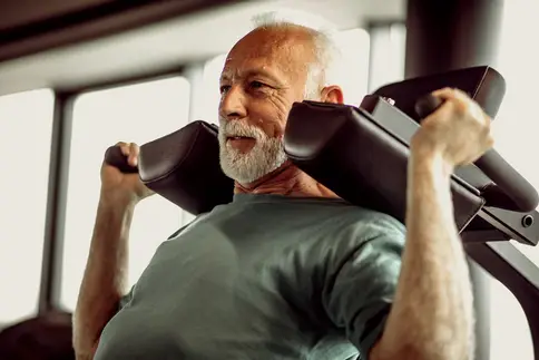 photo of mature man working out