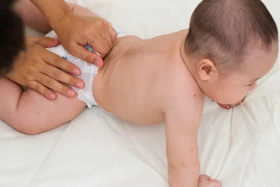 photo of checking baby's diaper