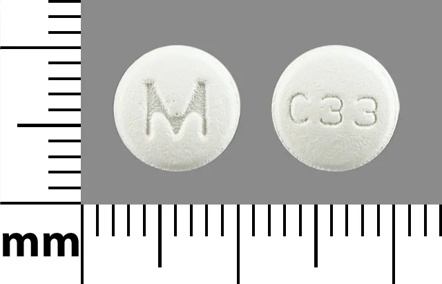 Carvedilol (Coreg, Coreg CR) M C33 Pill Image
