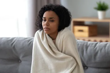 When your body temperature drops below normal, your body may create chills to warm up. It does this by quickly and involuntarily contracting and relaxing your muscles. (iStock/Getty Images)