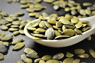 Pepitas are seeds from specific varieties of pumpkin with the hulls removed. They're a nutritious snack rich in unsaturated fats and minerals. (Photo Credit: Moment/Getty Images)
