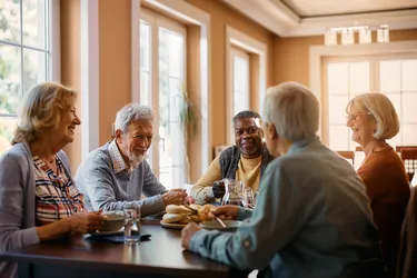Adult day services offer a change of scenery and a chance for socialization. This type of respite care can help ward off feelings of isolation. (Photo Credit: iStock/Getty Images)