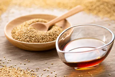 Sesame oil takes on an amber color when toasted. It adds nutty flavor to dips and dressings, but toasted sesame oil isn't the best choice for cooking because of its smoke point. (iStock/Getty Images)