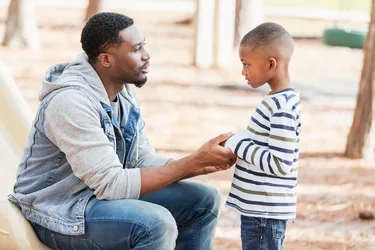 If your child stutters, listen attentively to what they are saying. Maintain normal eye contact without showing signs of impatience or frustration. (Photo Credit: E+ / Getty Images)
