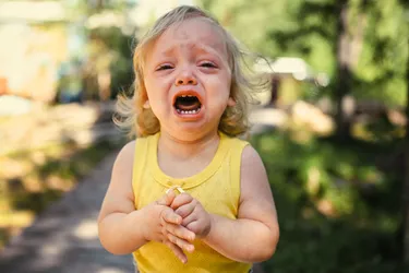 A tantrum can happen when a young child is tired or frustrated, or during daily routines like bedtime, mealtime, or getting dressed. What's not typical is when the outburst comes out of nowhere, or is so intense that the child becomes exhausted. (Photo Credit: Alina Vasylieva/Dreamstime)
