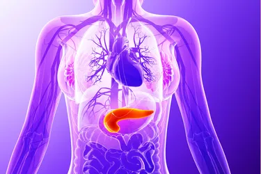 Your pancreas sits behind your stomach. It produces enzymes and hormones that help you digest food and that regulate blood sugar. (Science Photo Library/Getty Images)