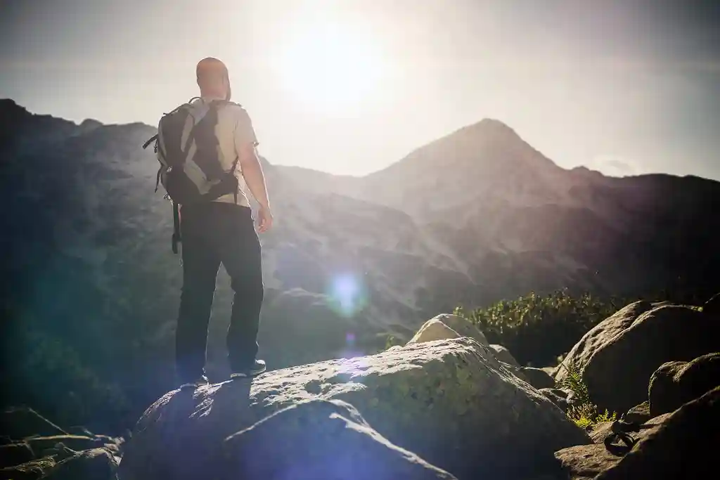 photo of hiker in the mountains