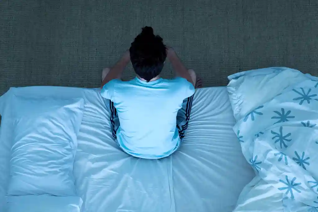 photo of man unable to sleep