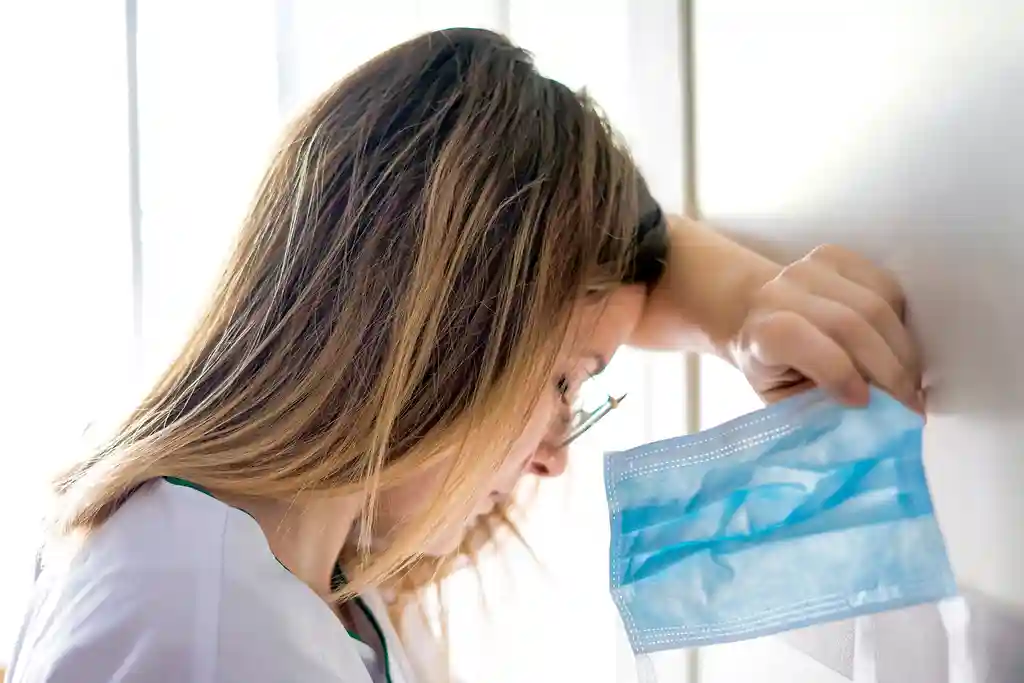 photo of exhausted medical worker