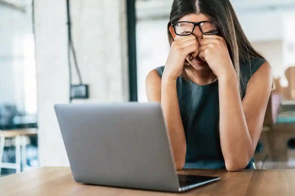 photo of exhausted businesswoman