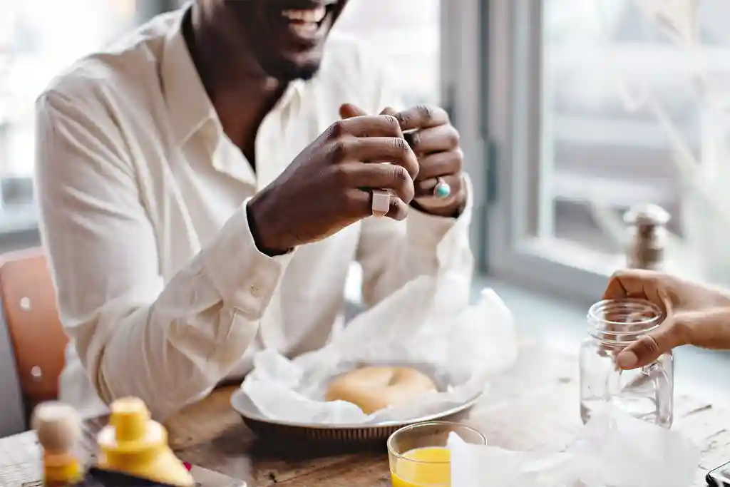 photo of man having brunch at restaurant