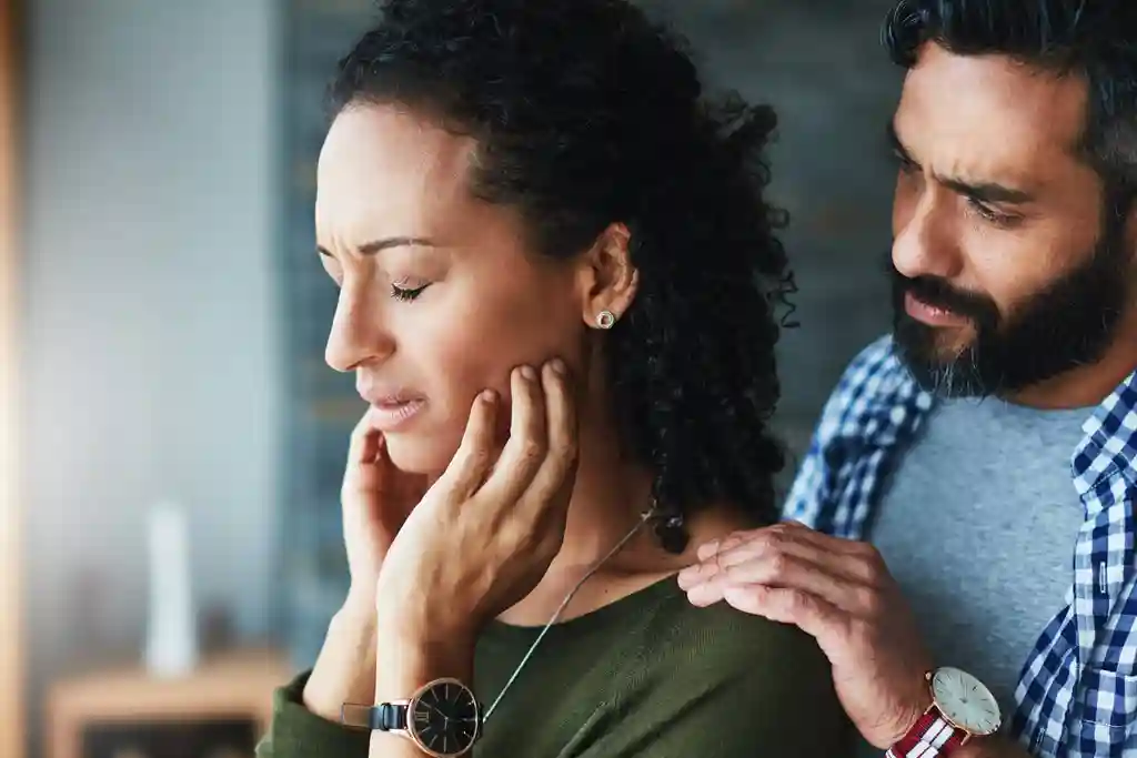 man consoling woman