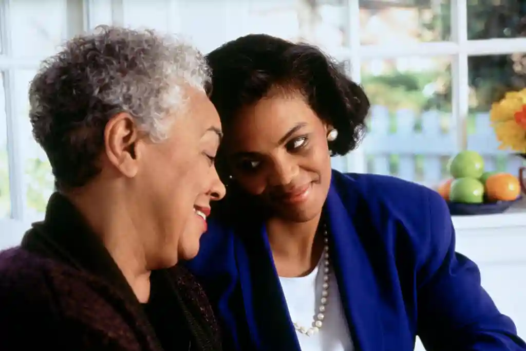 photo of mother and daughter talking