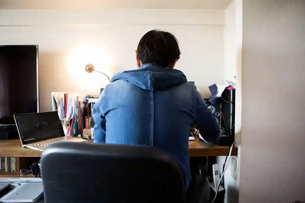 photo of man working from home