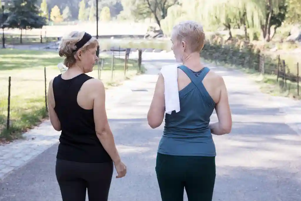 photo of mature women exercising at park