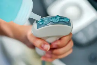 photo of pouring gel on ultrasound machine