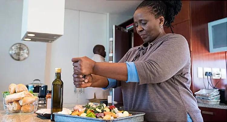 photo of mature woman cooking