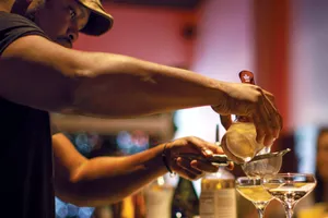 Chris Marshall mixes drinks at Sans Bar in Austin, Texas.