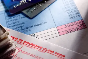 photo of medical bills and paperwork