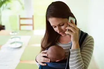 photo of mother using phone