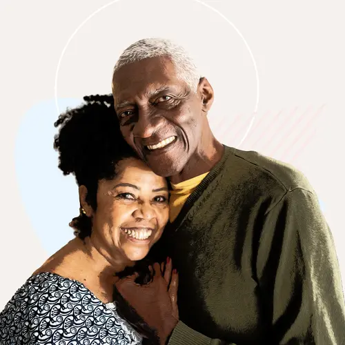 photo of older man and woman hugging