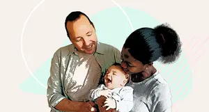 photo of happy parents with baby