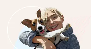 photo of happy woman with dog