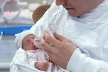 You can care for and bond with your premature baby in the NICU until they're ready to come home. (Photo credit: Joseph Nettis/Science Source)