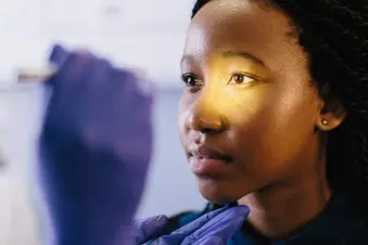 photo of doctor performing eye exam