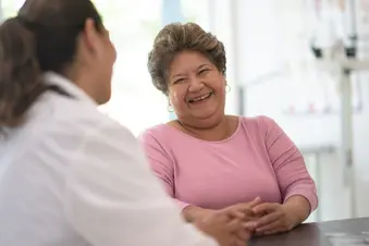 doctor talking with senior woman