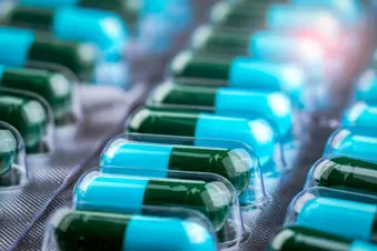 photo of lifestyle medication blue green pills