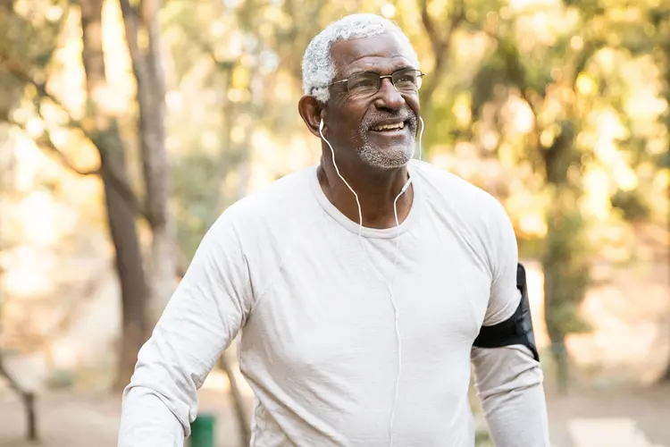 photo of mature man hiking