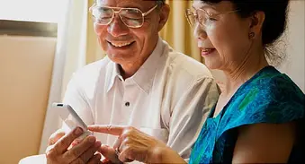 couple looking at tracker app