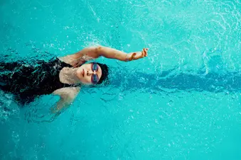 photo of woman swimming