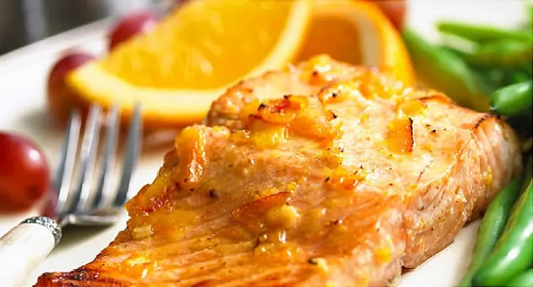 grilled salmon and orange wedge