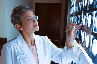 doctor looks at xray