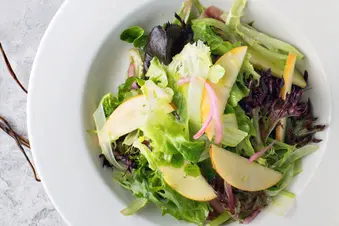 photo of fall salad with pear slices