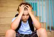 preteen boy looking stressed