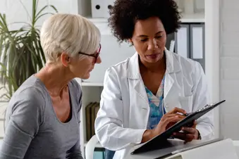 photo of doctor patient consultation