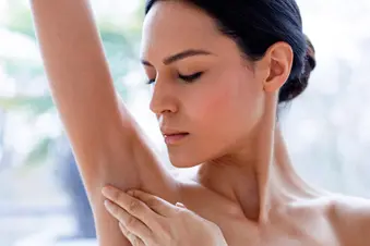 woman checking skin