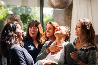photo of group of female friends having fun