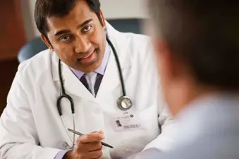 doctor talking to patient
