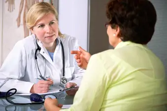 woman talking to doctor