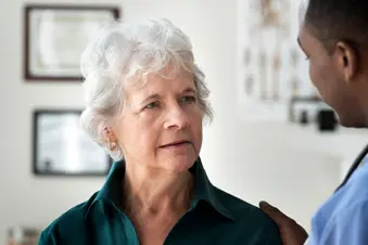 photo of senior patient talking with 