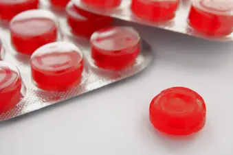 photo of red cough drops in a pack