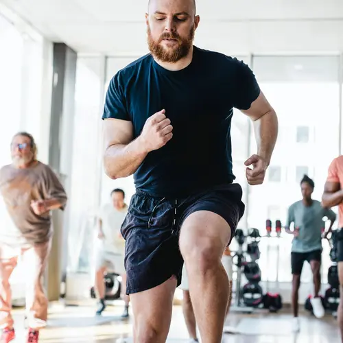 photo of man in exercise class