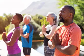 photo of mature yoga class